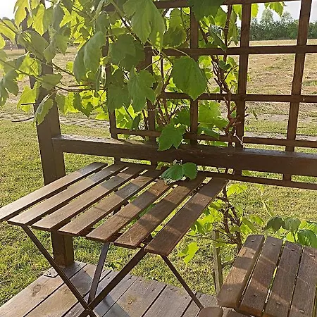 Деревянный коттедж Letniskowe Pod Orzechem Dziwnowek-wrzosowo *