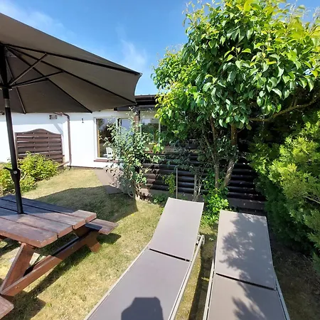 Деревянный коттедж Letniskowe Pod Orzechem Dziwnowek-wrzosowo